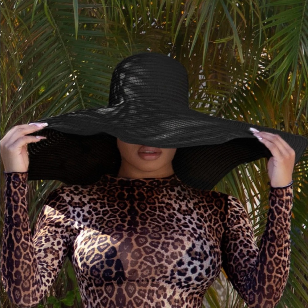 Oversized black sun/ beach hat from Matte Collection.